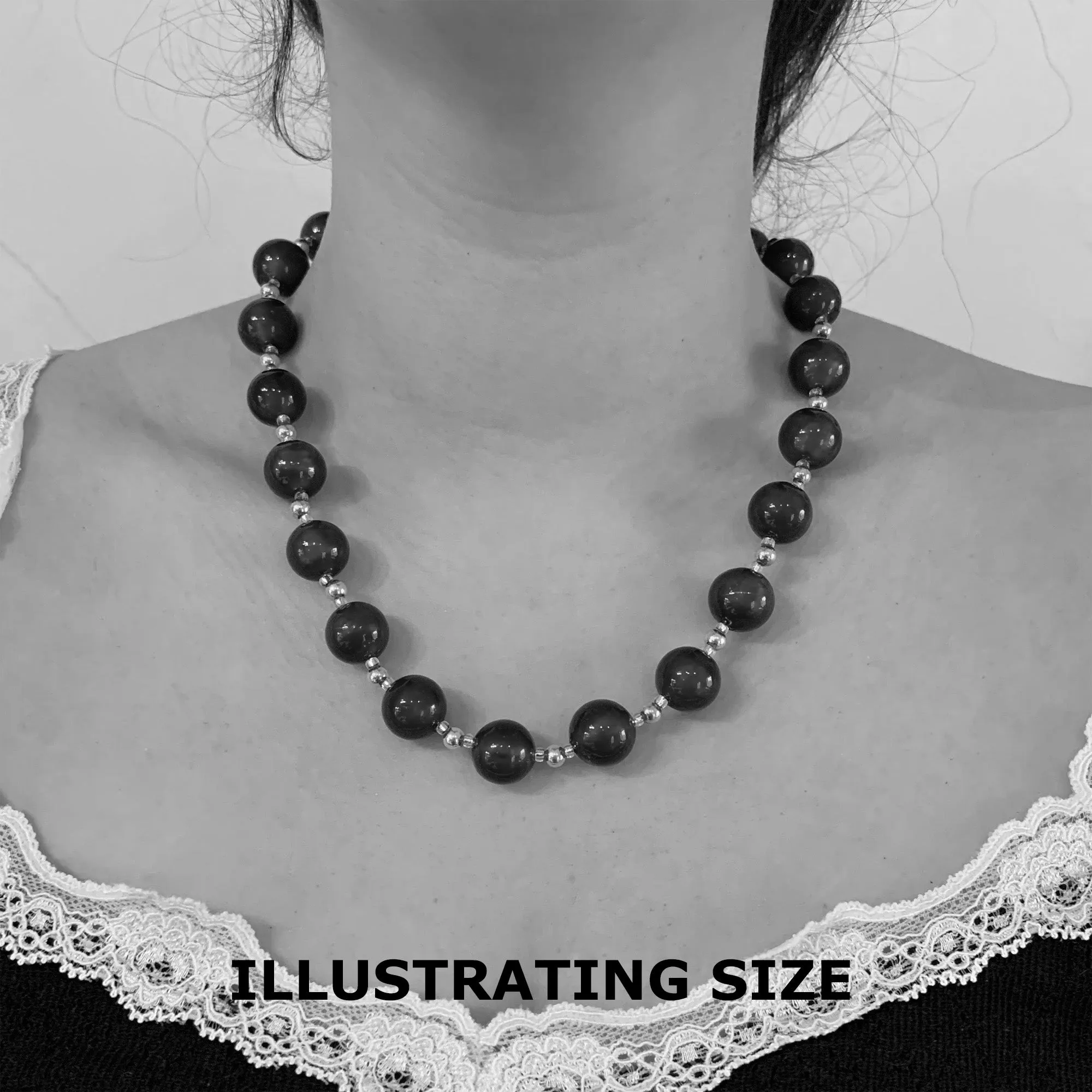 Necklace with matt black Murano glass small sphere beads on gold stardust beads and clasp